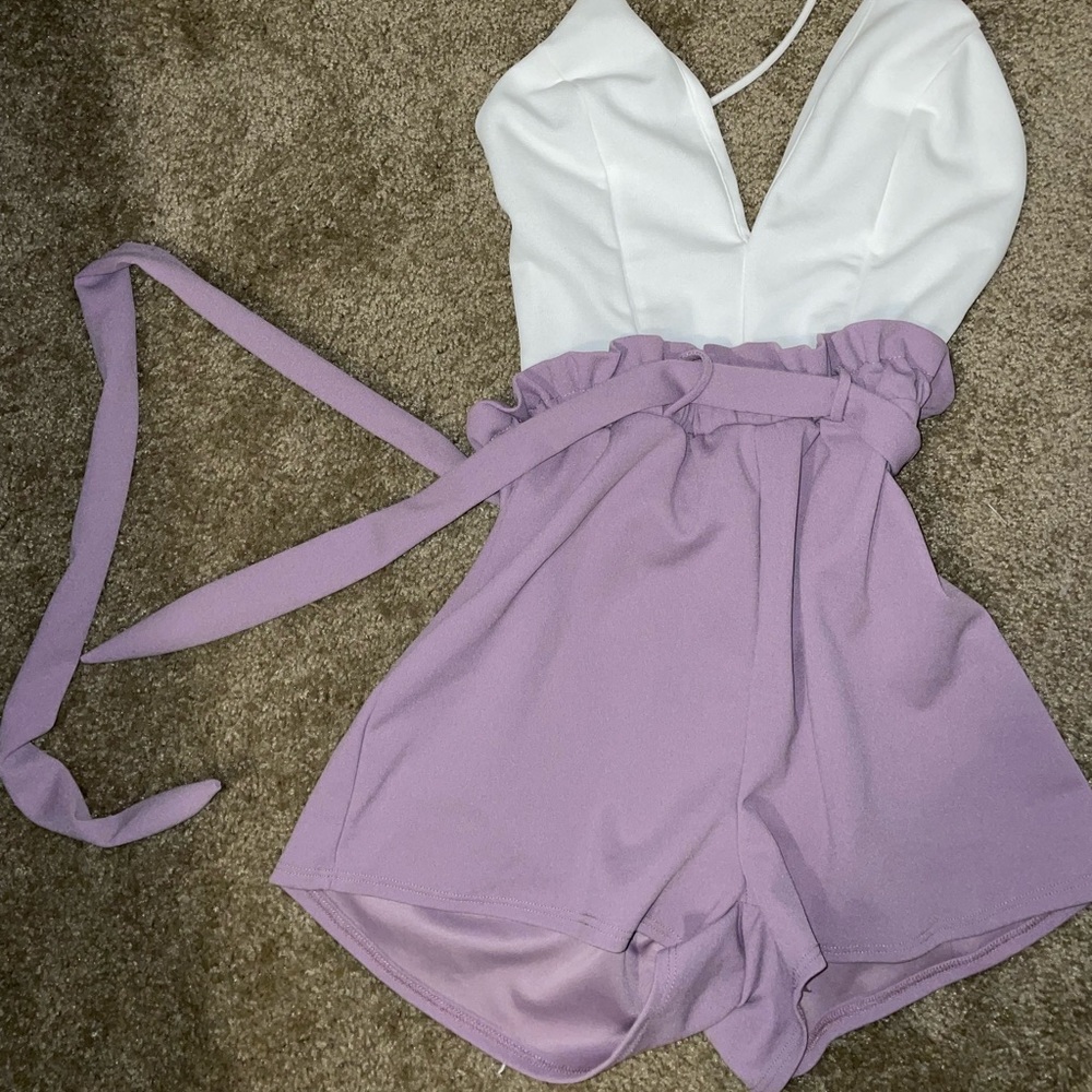 Super cute light purple romper with crisscrossed back